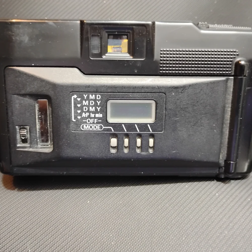 Nikon Black Camera with Gold Detail